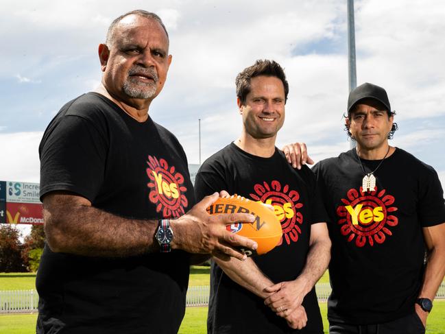 AFL Legends Michael Long, Gavin Wanganeen and Andrew McLeod at a doorstep in support for an Indigenous Voice to Parliament at Thiem Kia Oval, Woodville/ Kaurna Yarta on Saturday, October 7, 2023. (The Advertiser/ Morgan Sette)