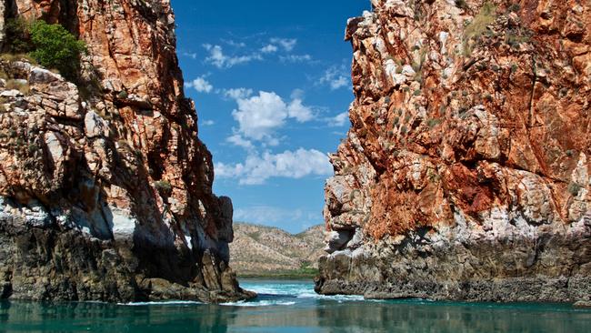 Tourist vessels squeeze between narrow gorges at the famous Horizontal Falls. Picture: Fleur Bainger