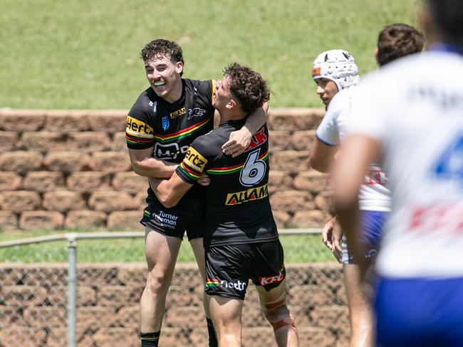 Mitchell Heather celebrates with William Herbert after scoring a try. Picture: Julian Andrews