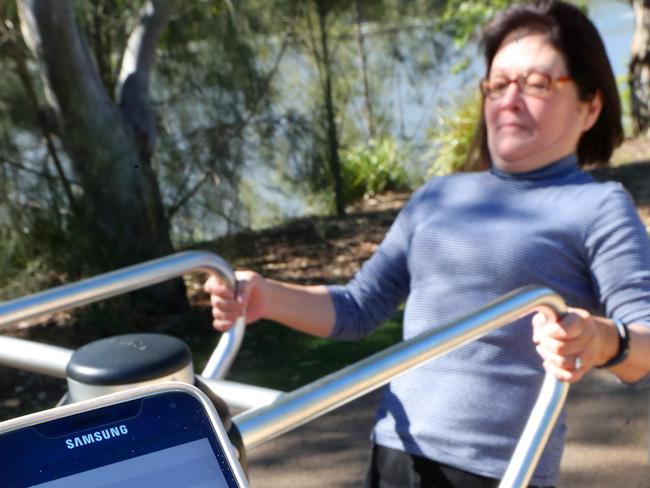 Janice Lewis, who has type 2 diabetes and is taking part in a University of Queensland research program using a phone phone app and a wrist-worn heart rate monitor to teach people how to get enough exercise to improve blood sugar levels. Picture: Liam Kidston