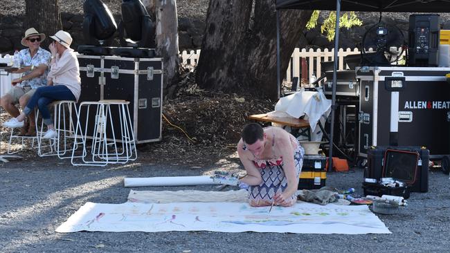 Laura Crane Creative doing a live painting at Rockhampton River Festival.