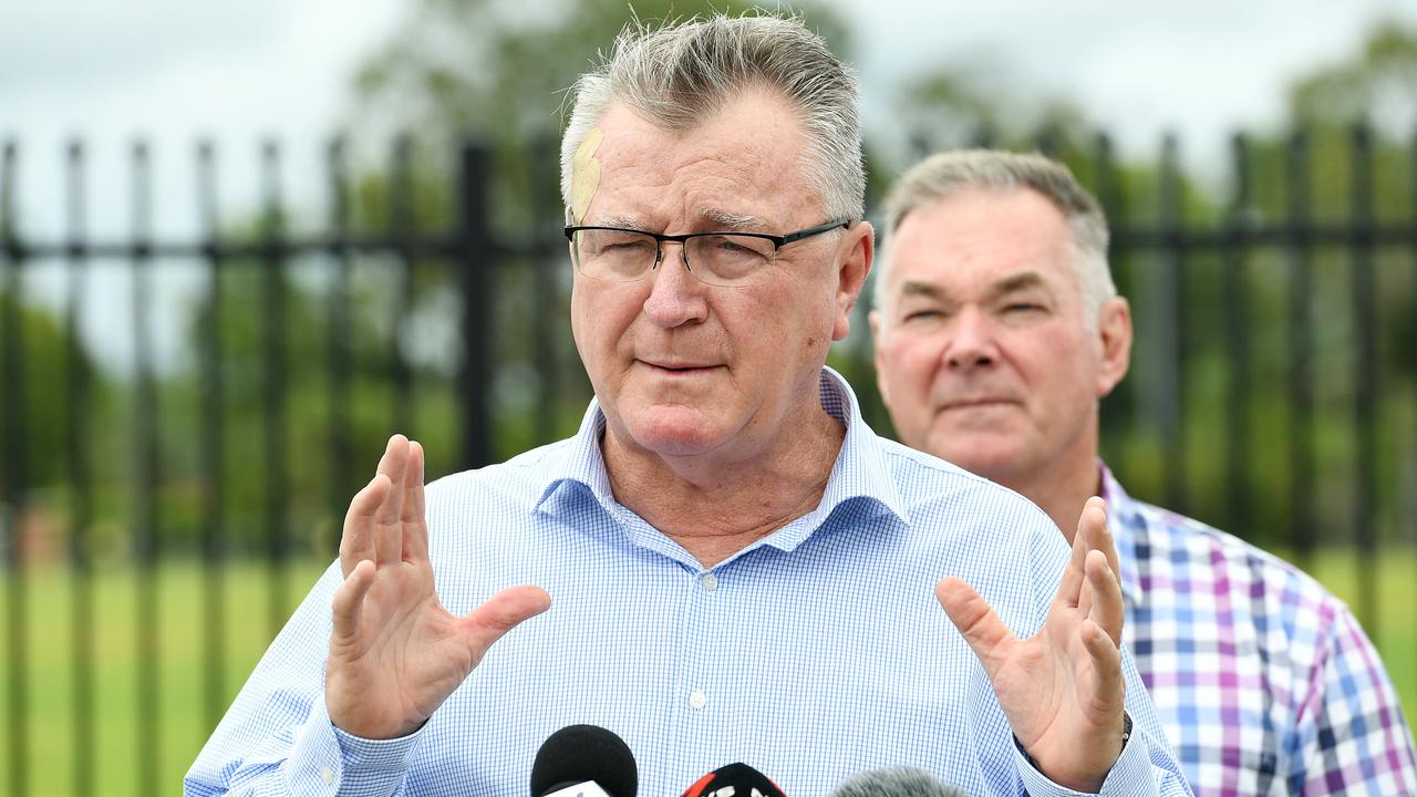 Mundingburra MP Les Walker talks about local crime in Townsville, while Resources Minister Scott Stewart looks on. Picture: Shae Beplate.