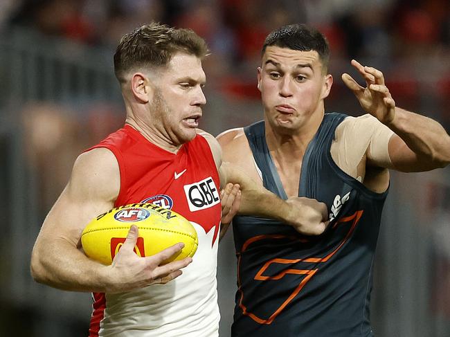 Sydney's Taylor Adams and Giants Finn Callaghan during the Round 15 AFL Sydney Derby between the GWS Giants and Sydney Swans at Engoe Stadium on June 22, 2024. Photo by Phil Hillyard(Image Supplied for Editorial Use only - **NO ON SALES** - Â©Phil Hillyard )