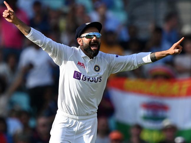 Kohli didn’t hold back. (Photo by Glyn KIRK / AFP)