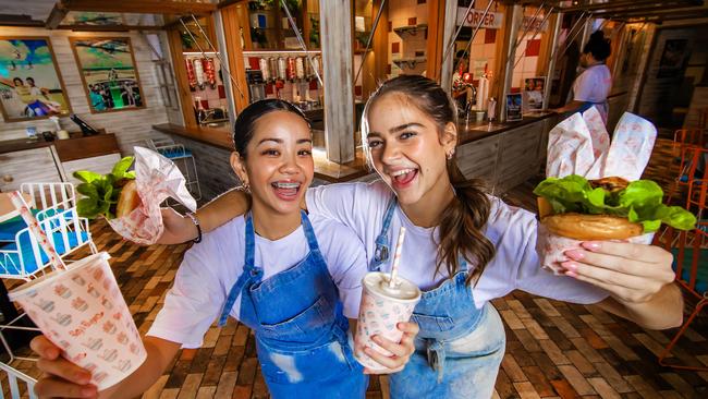 Keisha Padua, 16 and Sophia Mayes, 18 at Betty's Burgers Pacific Fair. Picture: Nigel Hallett