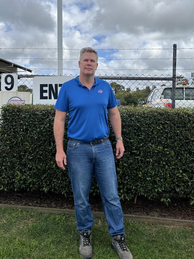 Brad Neven of JRT Group standing outside the business’s machinery yard in Yeppoon.