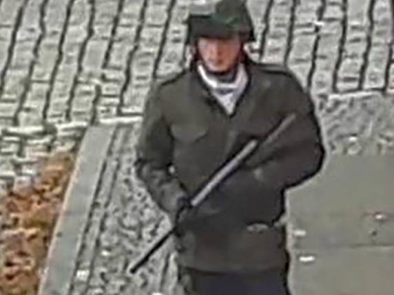 In this screenshot taken from a video by ATV-Studio Halle, a man walks with a gun in the streets of Halle an der Saale, eastern Germany, on October 9, 2019. Picture: Andreas Splett / ATV-Studio Halle / AFP