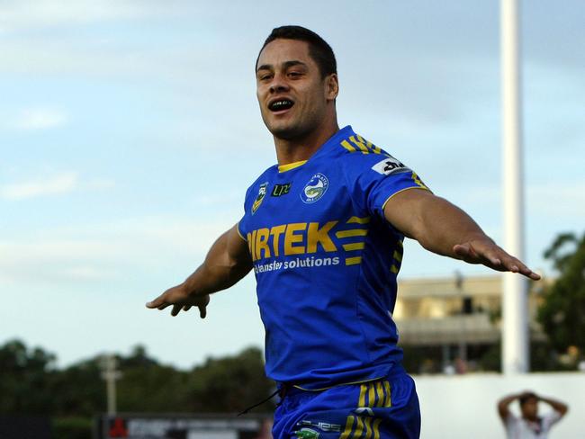 Jarryd Hayne celebrates after scoring a try during the Round 1 NRL match between the Parramatta Eels and the New Zealand Warriors at Parramatta Stadium. Picture: AAP Image/Action Photographics, Renee McKay