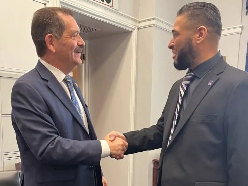 Eric Rodriguez, father of suspected terrorist Elias, with Chicago Congressman Chuy Garcia in March. Picture: Instagram/@seiuhcii