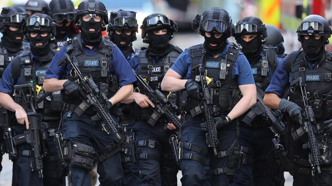 Counter terrorism officers march near the scene of the London terrorist attack. Picture: Dan Kitwood LIVE: London attack declared as terrorism