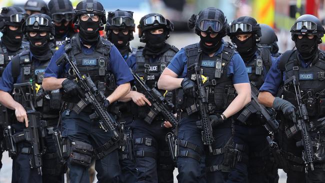 Counter terrorism officers march near the scene of the London terrorist attack. Picture: Dan Kitwood <a capiid="9732c6ce91f679749bb6b95989fad5b3" class="capi-video">LIVE: London attack declared as terrorism</a>