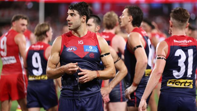 Christian Petracca of the Demons and team mates look dejected after the Opening Round AFL match between Sydney Swans and Melbourne Demons at SCG, on March 07, 2024, in Sydney, Australia. (Photo by Matt King/AFL Photos/Getty Images)