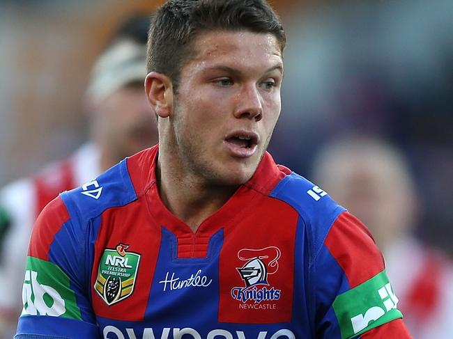 NEWCASTLE, AUSTRALIA - JUNE 25: Jack Cogger of the Knights passes the ball during the round 16 NRL match between the Newcastle Knights and the St George Illawarra Dragons at Hunter Stadium on June 25, 2016 in Newcastle, Australia.  (Photo by Tony Feder/Getty Images)