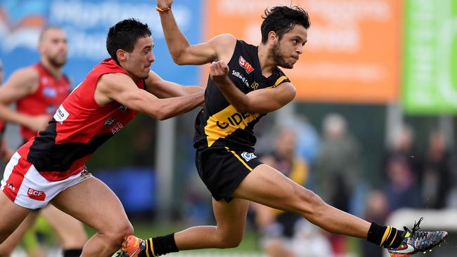 Glenelg’s Ian Milera kicks for goal agains West Adelaide. Picture: Mark Brake