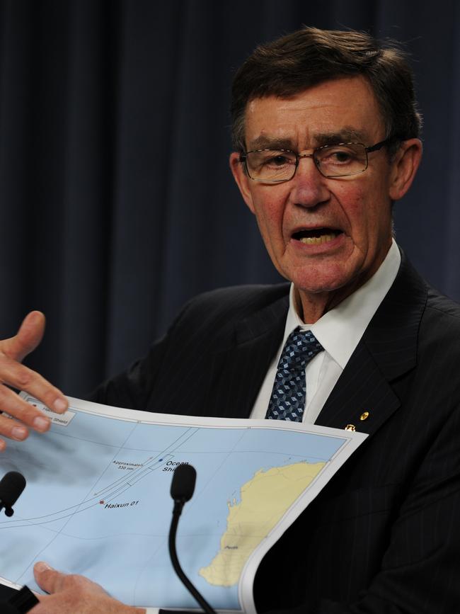 Sir Angus Houston briefs the media on the search for MH370 in 2014. Picture: AFP