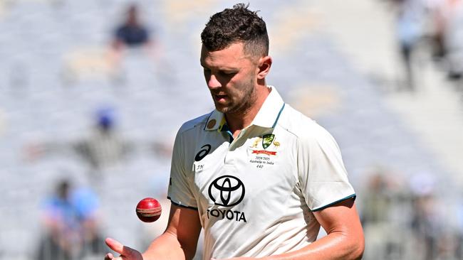 Josh Hazlewood will miss the Adelaide Test through injury. (Photo by SAEED KHAN/AFP)