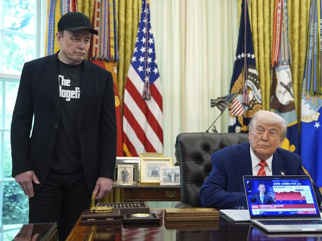 President Donald Trump, right, attends a news conference with Elon Musk in the Oval Office of the White House, Friday, May 30, 2025, in Washington. (AP Photo/Evan Vucci)