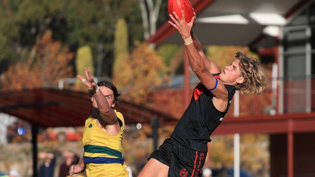 Rostrevor's Jack Hodges takes a contested mark against Pembroke in 2021. He’s set for a big 2022. Picture: Supplied, Claude Beltrame