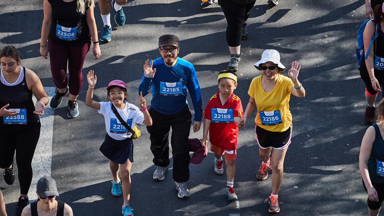 City to Bay participants walking in Adelaide, Sunday, Sept. 15, 2019. Picture: MATT LOXTON