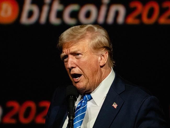 (FILES) Former President and 2024 Republican presidential candidate Donald Trump gives a keynote speech on the third day of the Bitcoin 2024 conference at Music City Center July 27, 2024 in Nashville, Tennessee. Trump's triumphant return to the White House signals a potential golden era for cryptocurrencies, whose influential backers heavily supported his presidential bid. After years of ascendancy following bitcoin's emergence, the cryptocurrency industry had fallen into a "crypto winter," plagued by scandals and hostile regulatory oversight. But Trump's impending presidency has spurred an enthusiastic market response, with bitcoin surging more than 25 percent in a week and breaking through the $90,000 mark for the first time. (Photo by Jon CHERRY / GETTY IMAGES NORTH AMERICA / AFP)