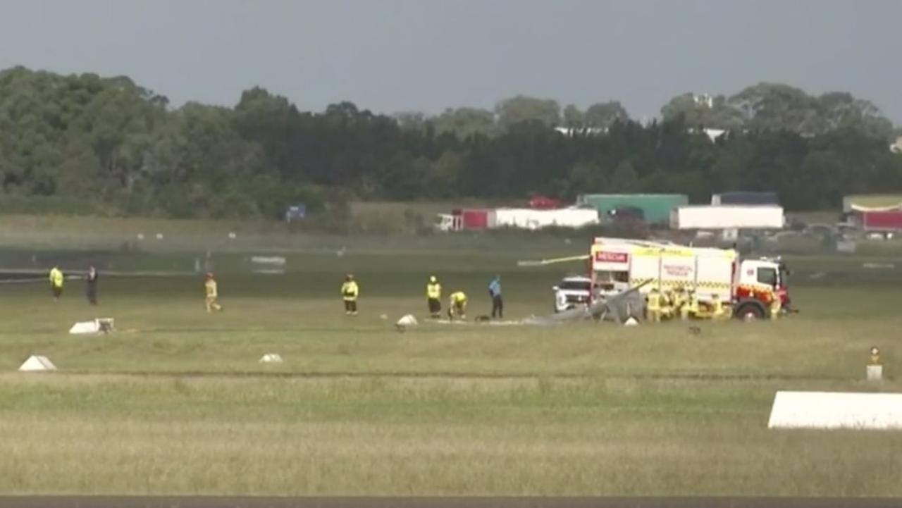 Bankstown, NSW: Pilot trapped after plane crash at Bankstown Airport ...