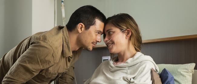 Heart break … Luke Arnold and Brooke Satchwell in a tender scene from acclaimed Foxtel drama series The End.