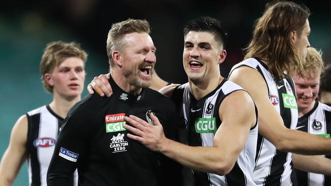 Outgoing Magpies coach Nathan Buckley celebrates victory with Brayden Maynard. Picture: Getty Images