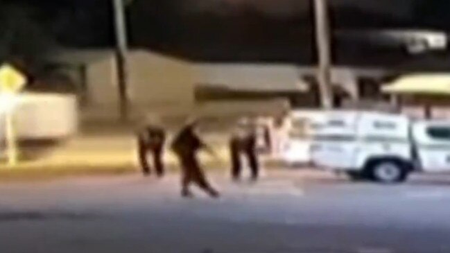 CCTV footage shows a teenager wielding a knife before being shot by police after stalking officers and stabbing a man in a suburban carpark in Perth. picture: 7 News ,