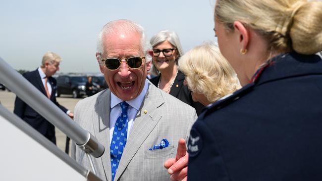 A Samoa-bound King Charles is all smiles at Sydney airport on Wednesday after his five days in Australia. Picture: AAP