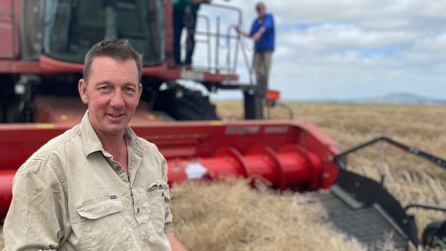 Hamilton farmer Andrew Nagorcka harvesting canola with header driver Jamie Semmler and son Alistair Semmler. Picture: Kate Dowler