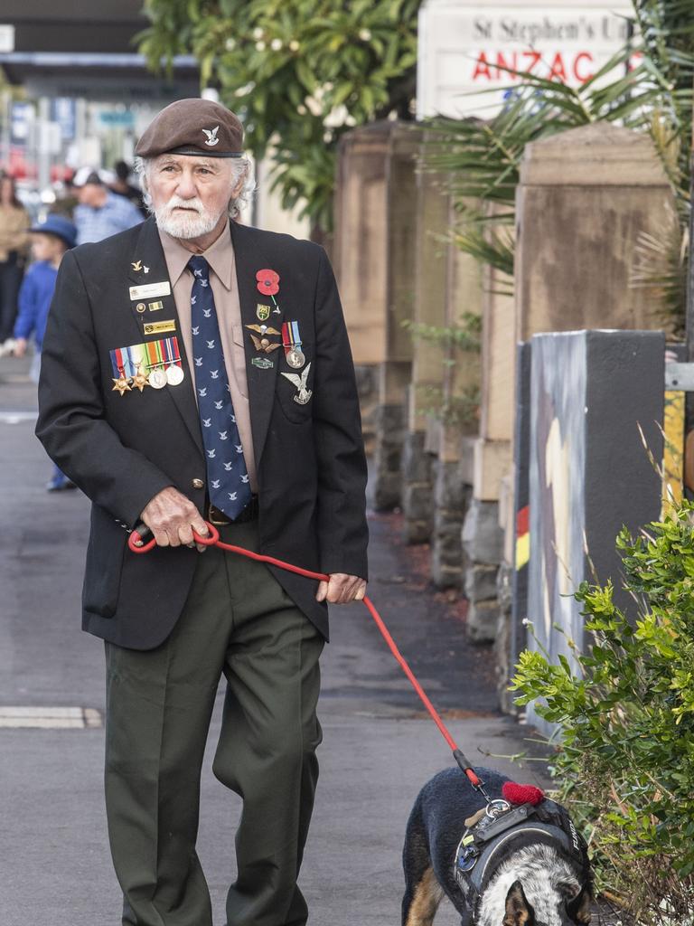 Wally Insch with service dog in training Funda. Wally was a sergeant in the Rhodesian Army. Miid morning parade on ANZAC DAY. Tuesday, April 25, 2023. Picture: Nev Madsen.