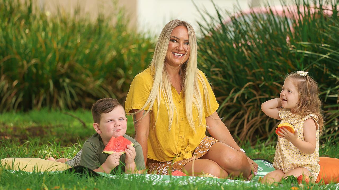 Jacinta Rogers with her kids Reine and Myah Rogers-Birrell. Picture: Glenn Campbell