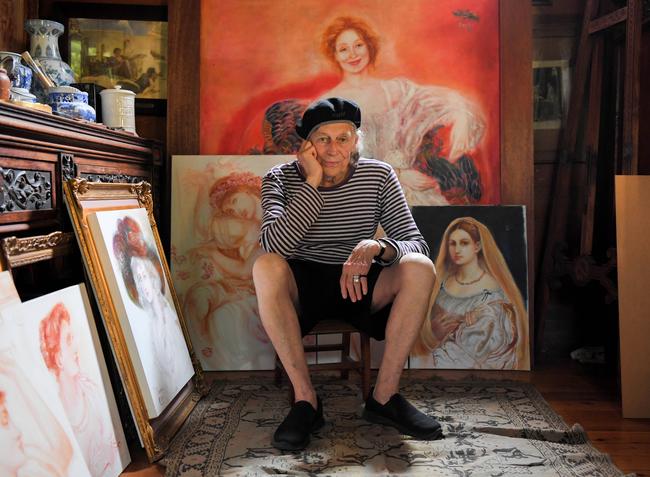 Renowned Australian actor Barry Otto at home with some of his paintings. His portrait of daughter Miranda is on the wall behind him. Picture: Simon Bullard