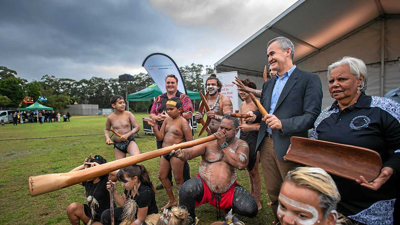 Woolworths reconciliation plan, launch at Fitzroy oval.Woolworths Group CEO Brad Banducci taps sticks with Coffs Harbours' Wajaar Ngaarlu dance group. . 05 July 2019. Picture: TREVOR VEALE