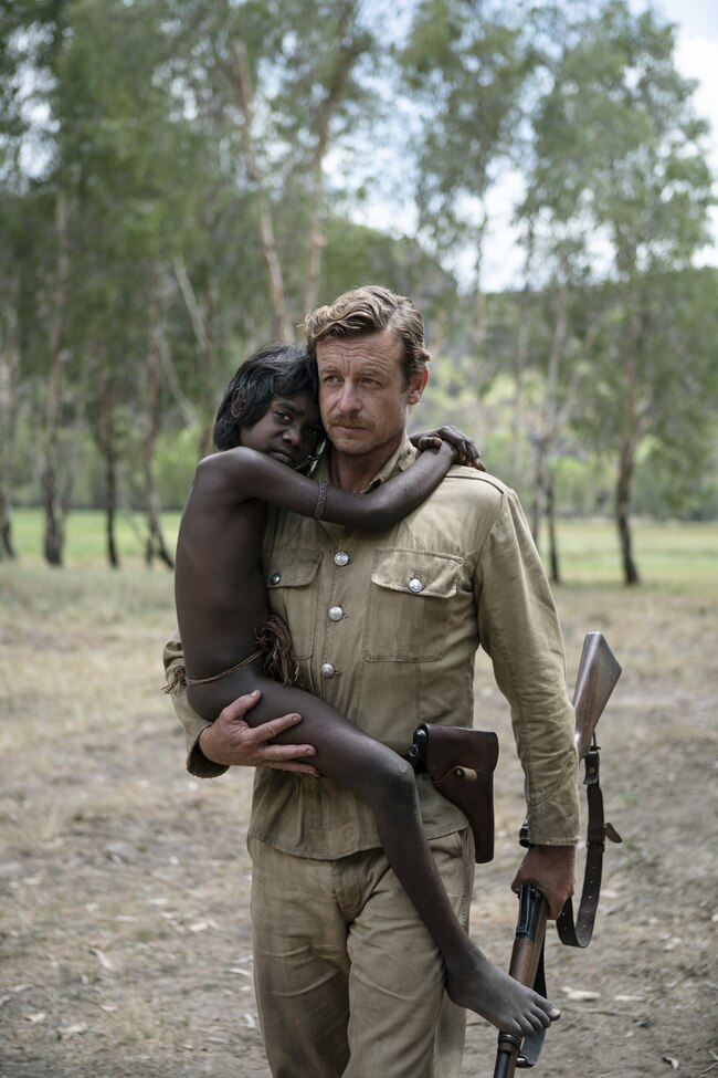 Simon Baker rescues the young Gutjuk (Guruwuk Mununggurr) in High Ground. Picture: Madman Entertainment