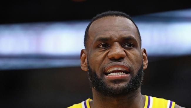 CHICAGO, ILLINOIS - MARCH 12: LeBron James #23 of the Los Angeles Lakers talks with a teammate during a game against the Chicago Bulls at the United Center on March 12, 2019 in Chicago, Illinois. The Lakers defeated the Bulls 123-107. NOTE TO USER: User expressly acknowledges and agrees that, by downloading and or using this photograph, User is consenting to the terms and conditions of the Getty Images License Agreement. Jonathan Daniel/Getty Images/AFP == FOR NEWSPAPERS, INTERNET, TELCOS &amp; TELEVISION USE ONLY ==