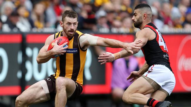 Whitecross evades Essendon’s Adam Saad in 2018. Picture: Michael Klein