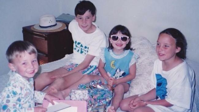 Family members of murdered Leeton schoolteacher Stephanie Scott have shared family photos of her on what would have been her 27th Birthday. Brother Scott (left), Stephanie wearing glasses.