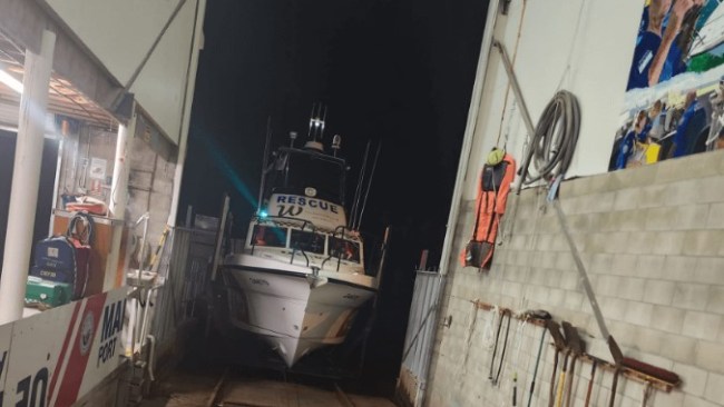 The two people onboard the disabled yacht were returned to safety on the Hastings River in the early hours of Tuesday morning. Picture: Marine Rescue NSW