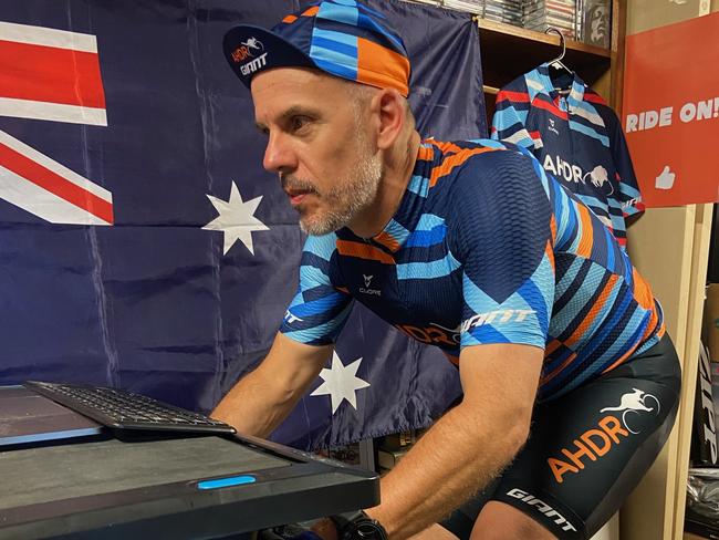 Sawtell, Coffs Harbour, man Tim Searle, is an ambassador and a multiple world record holder for the app Zwift, an online community which allows cyclists to compete and chat with one another using a 'smart' trainer bike from their home. Picture: Supplied