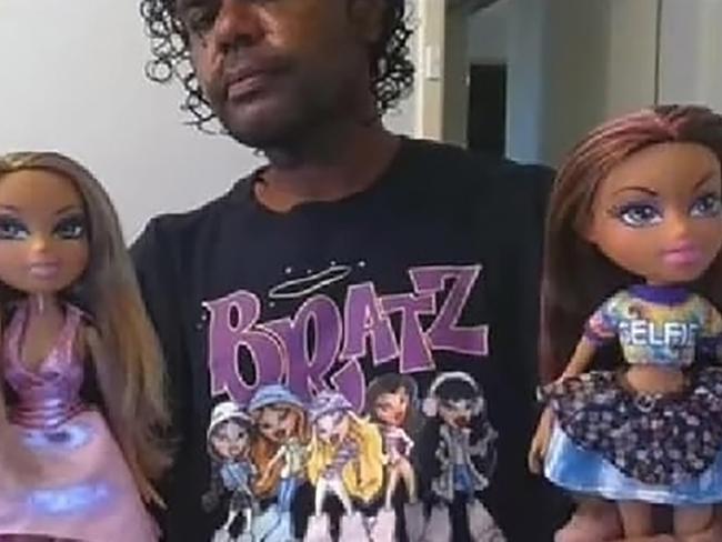 Terence Darrell Kelly, 36, with Bratz dolls.