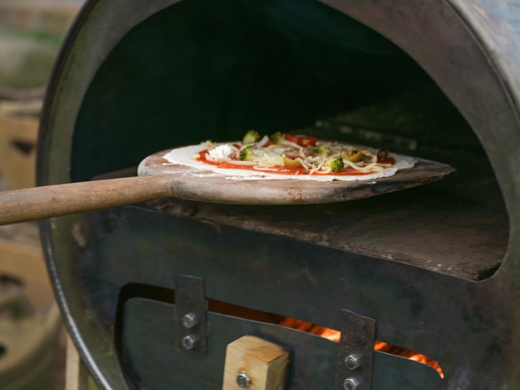 Pizza ovens within a holiday home came in the top five ‘foodie’ demands. Picture: iStock