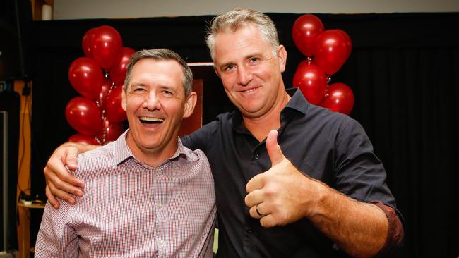 Chief Minister Michael Gunner and new Member for Johnston Joel Bowden celebrate winning the by-election on Saturday night. Picture: Glenn Campbell