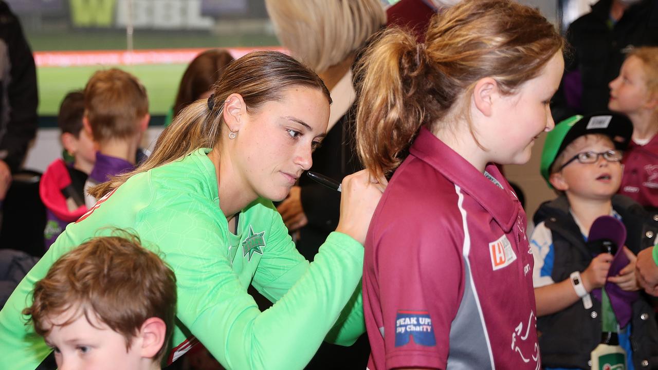 Stars keeper Nicole Faltum hangs with youngsters as rain wrecked the start of the match. Picture: Getty Images