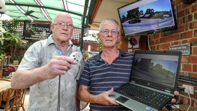 Happy Valley residents Graham Thomas and Jerome van der Linden displaying their car speeding detection equipment, having complaining to both Onkapringa Council and SAPOL about the amount of hooning going on near their homes. Picture: AAP/Russell Millard