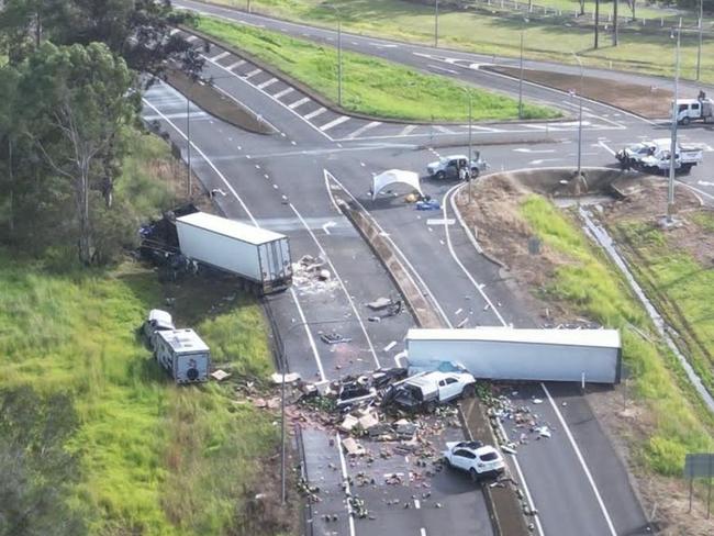 An aerial view of the site of the triple fatal at the intersection of Walker St and the Bruce Highway in Maryborough.