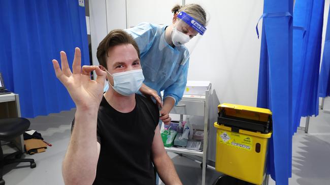 Anthony Naus, 30, gives AstraZeneca the thumbs up. Picture: David Caird