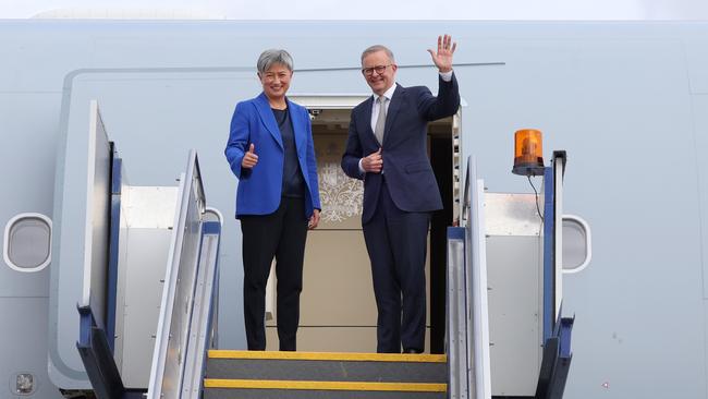 Prime Minister Anthony Albanese stands with newly appointed Foreign Minister Penny Wong on their way to the Quad leaders’ meeting in Tokyo. Picture: David Gray/Getty Images