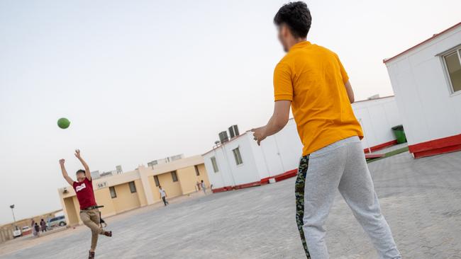 Afghanistan evacuees play with a ball at the temporary camp. Picture: Supplied/Australian Department of Defence