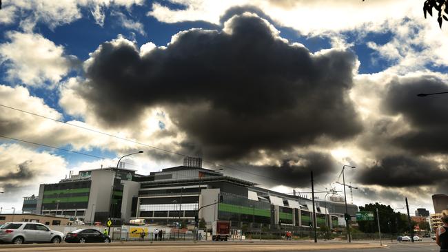 Grey clouds hang over the new Royal Adelaide Hospital, which is nearing completion. Pic. Tait Schmaal